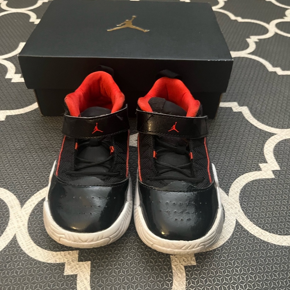 Kids Black and Red Jordan Sneakers